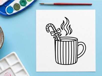 Steaming hot coffee mug with candy cane and snowflake on Christmas morning