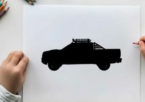 Silhouette of a pickup truck with a roof rack