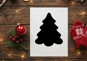 Minimalist black paper cut Christmas tree icon on a clean white background