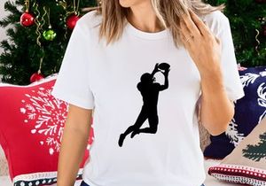 Silhouette of a person playing volleyball
