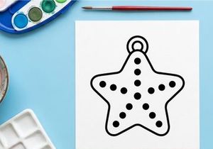 Silver star-shaped pendant with polka dot cutouts. Minimalist geometric jewelry charm for fashion and crafts.