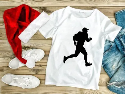 Silhouette of a man running with a backpack on in a dynamic pose