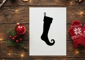Black silhouette of a Christmas elf stocking isolated on a white background.