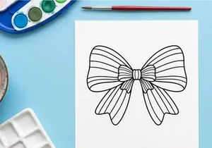 Hand drawn decorative Christmas gift bow isolated on white background for holiday design