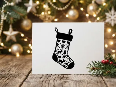 Icono navideño en blanco y negro con diseño de reno y motivo de copo de nieve.