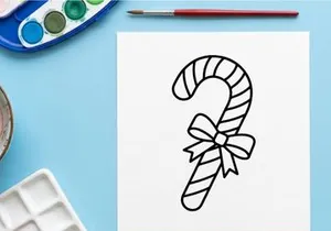 Christmas candy cane line art icon with a decorative bow for holiday design projects