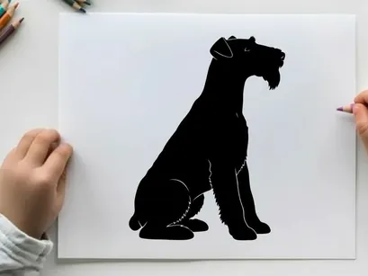 Silhouette of a sitting dog with mouth open