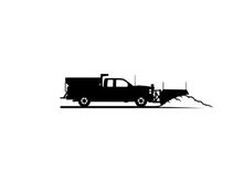 Silhouette of a truck plowing snow on a winter road