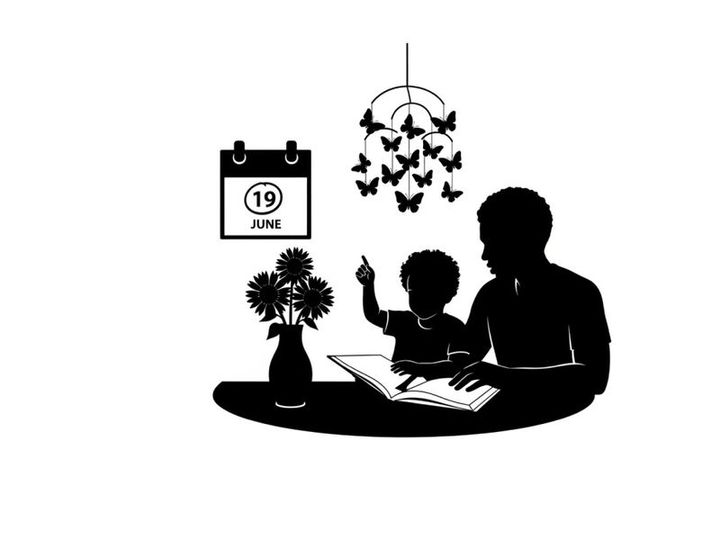 Silhouette of a man and child reading together on june 19th
