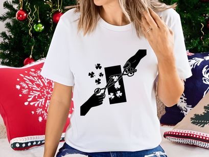 Hands Cutting Shamrocks Silhouette