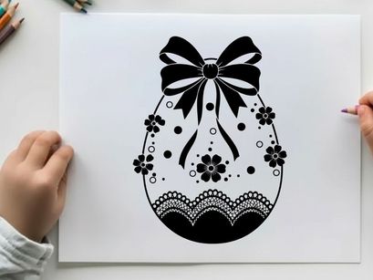 Easter egg silhouette with bow and floral patterns