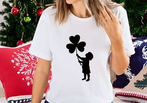 Girl holding heart shaped balloons black silhouette joy celebration