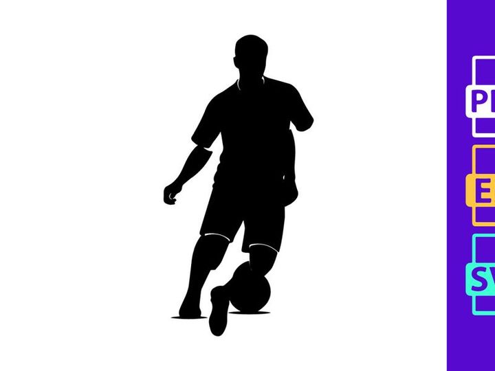 Silhouette of a soccer player kicking a ball in action