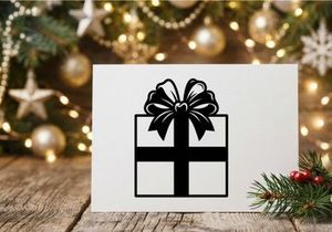 Black and white Christmas gift box with bow for holiday celebration