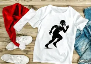 American football player in motion running with helmet and pads