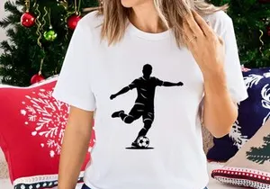 Soccer player kicking a ball in dynamic motion silhouette