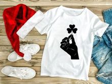 Hand holding black paper heart symbol love gesture minimalist design