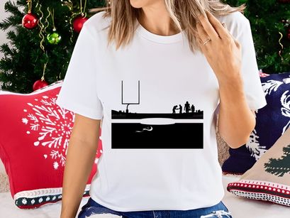 American football players on a field with goal post at dusk or dawn