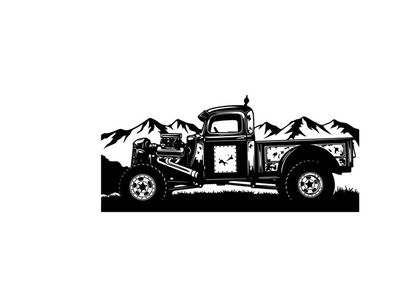 Vintage truck silhouette against majestic mountains