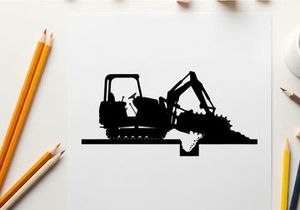 Silhouette of a black excavator digging into a pile of dirt