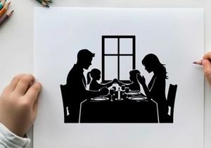 Family dinner in silhouette by the window