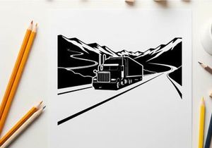 Truck driving through mountains in black and white silhouette