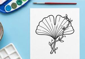Elegant fan with floral design. Traditional accessory for fashion and decor.
