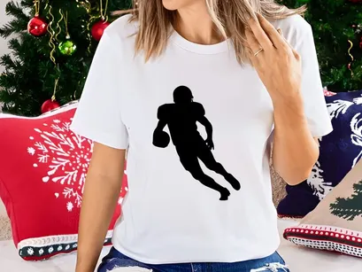 American football player running with ball in hand silhouette