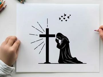 Silhouette of a person praying beside a cross silhouette preview picture