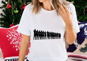 Silhouette of a line of people standing in a row with arms crossed