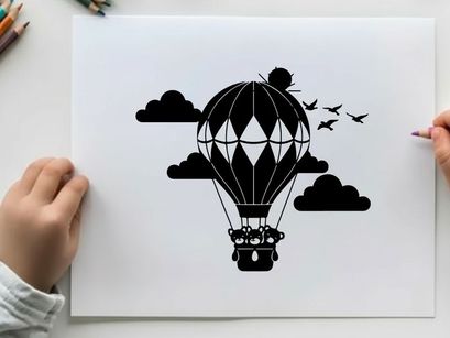 Hot air balloon silhouette flying through sunny sky with clouds