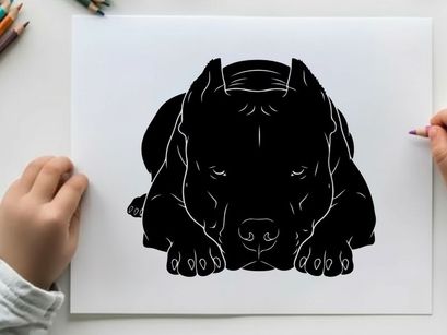 Silhouette of a dog lying down in a relaxed position