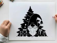 Christmas gnome silhouette with tree and gifts