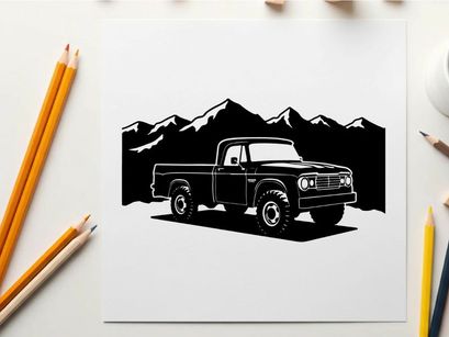 Silhouette of a pickup truck in front of mountains