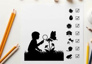 Child in silhouette examining a butterfly with a magnifying glass