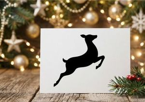 Silhouette of a jumping dog in motion on white background