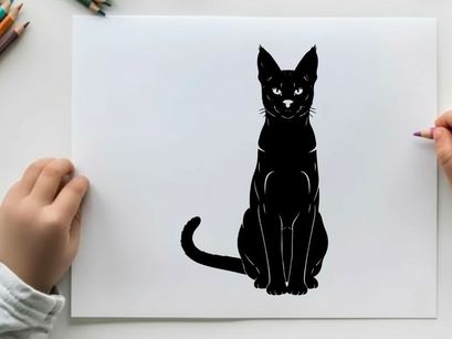 Black cat silhouette sitting upright facing forward