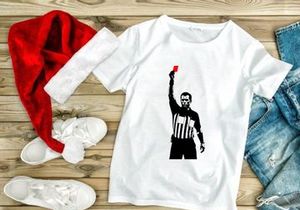 Referee holding a red card in a sports game for penalty or ejection