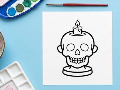 Halloween skull candle holder with lit flame. Spooky decorative ceramic skull for festive home decor and party centerpiece.