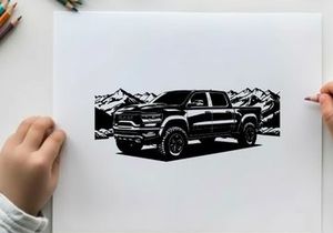 Silhouette of a pickup truck in front of mountains