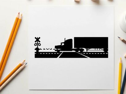 Truck silhouette crossing railroad tracks with warning signs