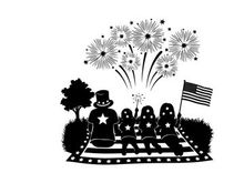 Patriotic family silhouette watching fireworks on railroad tracks