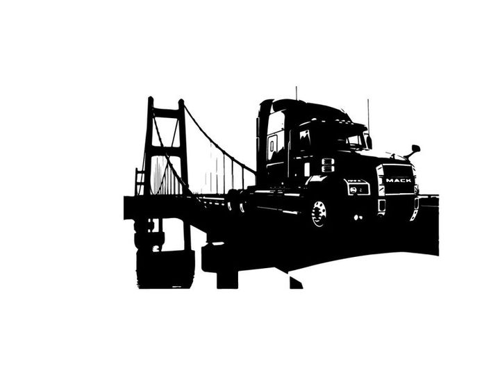 Silhouette of a semi truck driving across a suspension bridge
