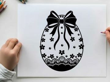 Easter egg silhouette with floral pattern and ribbon bow preview picture