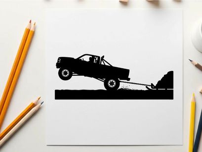 Silhouette of a pickup truck towing a trailer up a steep incline