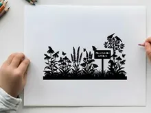 Silhouette of a pollinator garden with birds and flowers