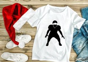 American football player in defensive stance silhouette