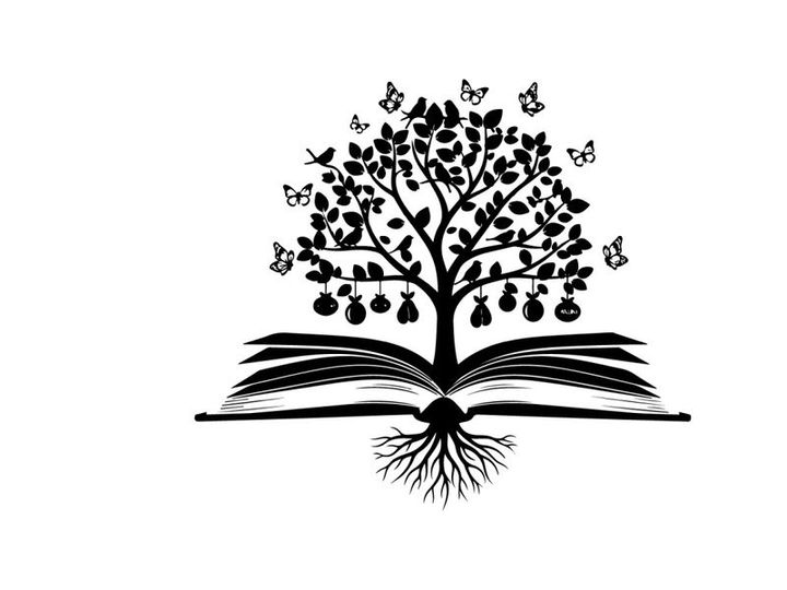 Silhouette of tree growing out of open book with butterflies