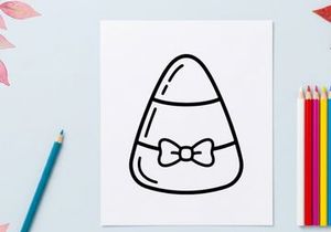 Candy corn icon with a bow tie. Halloween festive treat graphic for holiday design.
