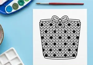 Christmas gift box icon with knitted texture and polka dot pattern in black and white line art